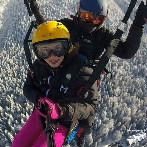 Pleasure flight with tandem paraglider. Filming included